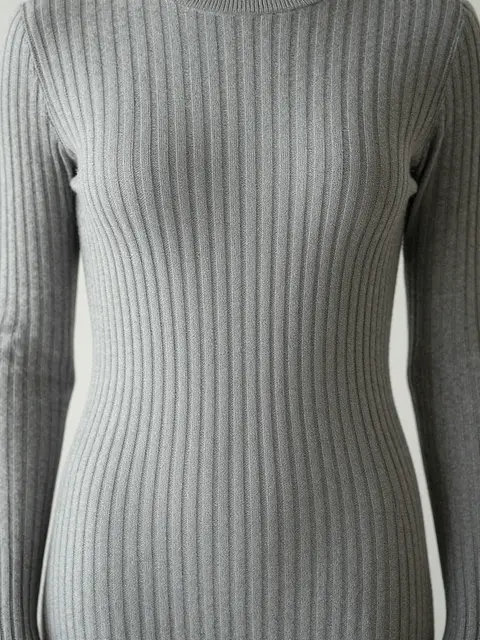 Close-up of a heather gray vertical ribbed knit sweater shown in soft even light