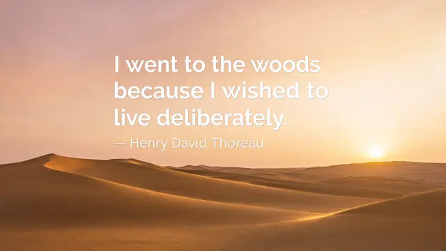 Golden desert dunes at sunset with overlaid text reading "I went to the woods because I wished to live deliberately. — Henry