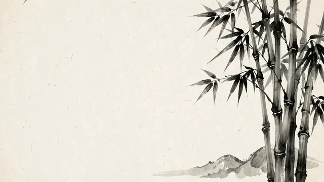 Traditional ink wash bamboo stalks sit on the right edge of textured rice paper with blank copy space on the left