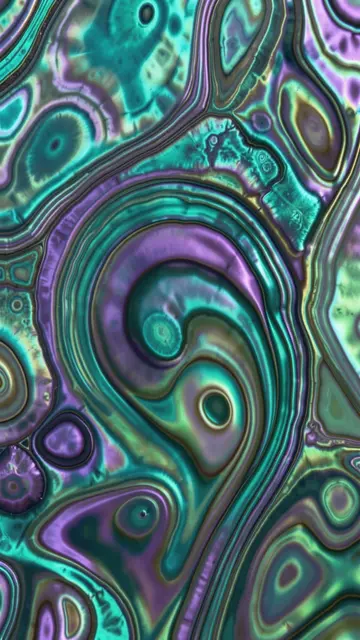 Full frame vertical macro close-up of swirling iridescent abalone shell sheen in teal, violet and green tones