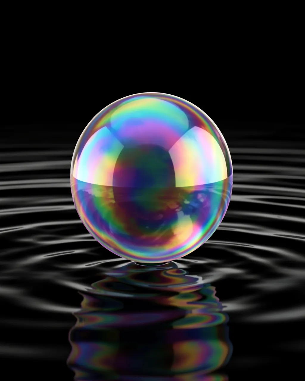 A glossy iridescent soap bubble rests just above rippled black water with a matching reflective surface.