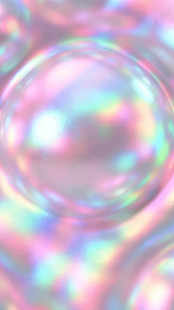 Glowing macro close-up of an iridescent pearl surface with pink, blue, and green holographic highlights