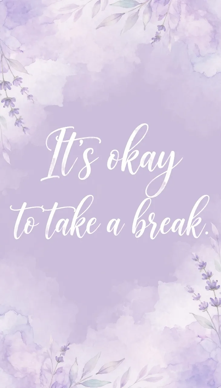 Soft lavender watercolor wallpaper with delicate floral borders and white script reading "It's okay to take a break."