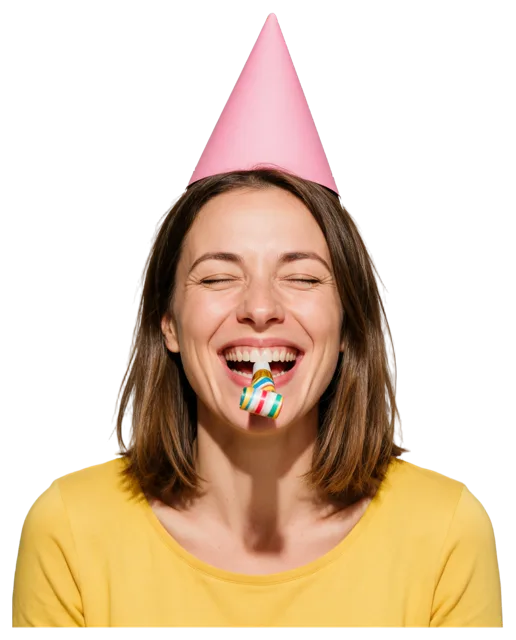 A woman with closed eyes laughs while wearing a pink party hat and blowing a striped party horn