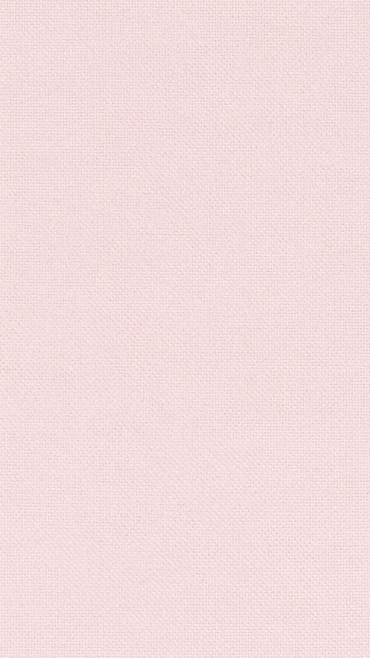 Full frame close-up of fine woven light pink linen fabric with even flat lighting