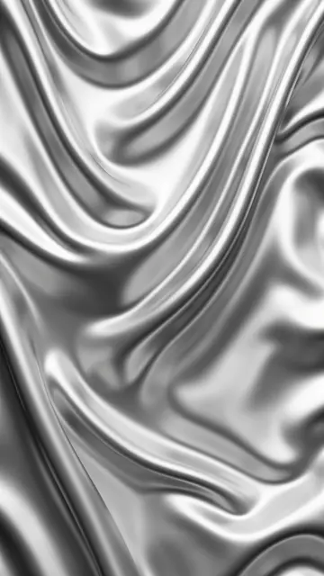 Vertical frame of smooth draped liquid silver chrome formed into soft flowing silk-like folds with gentle reflective