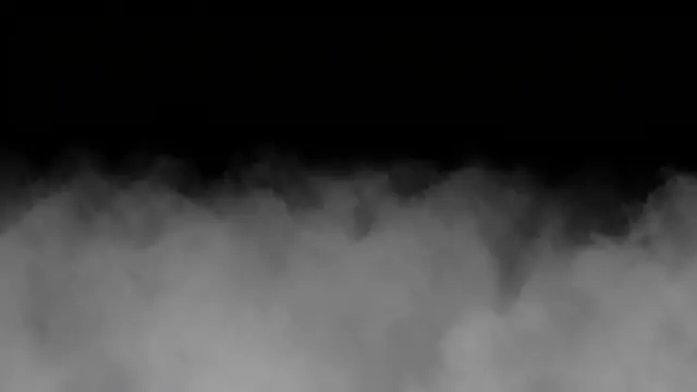 Soft wispy pale gray mist fills the lower frame against a solid pure black upper background
