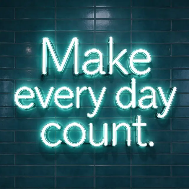 Glowing white neon sign reading "Make every day count." mounted on a dark teal tiled wall