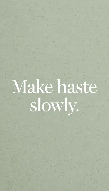 Centered white serif text reading "Make haste slowly." on a soft sage green subtle paper grain background