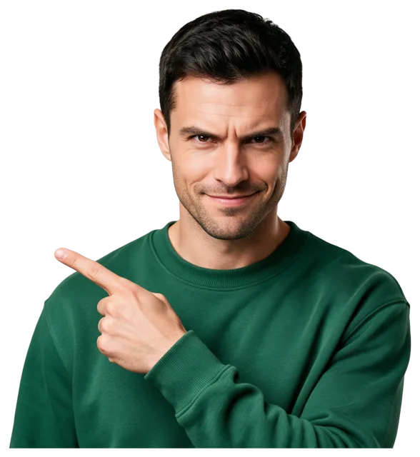 Waist-up shot of a man in a green crew sweatshirt pointing left while looking at the camera with a determined expression