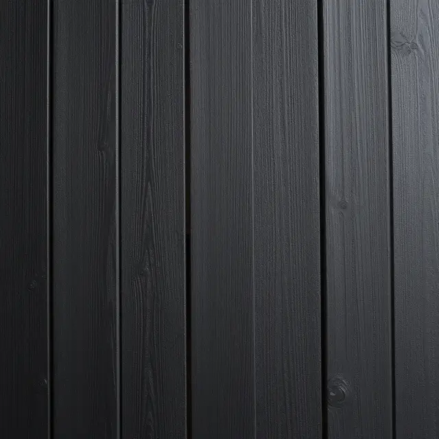 Full frame top view of matte black stained vertical wood planks with visible grain and narrow gaps