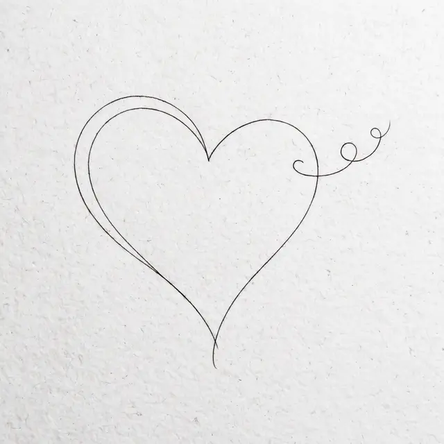 A thin black line drawing of a heart outline with trailing curls on textured white paper