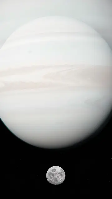 A banded pale mint and white gas giant sits above a tiny cratered moon in dark starry space