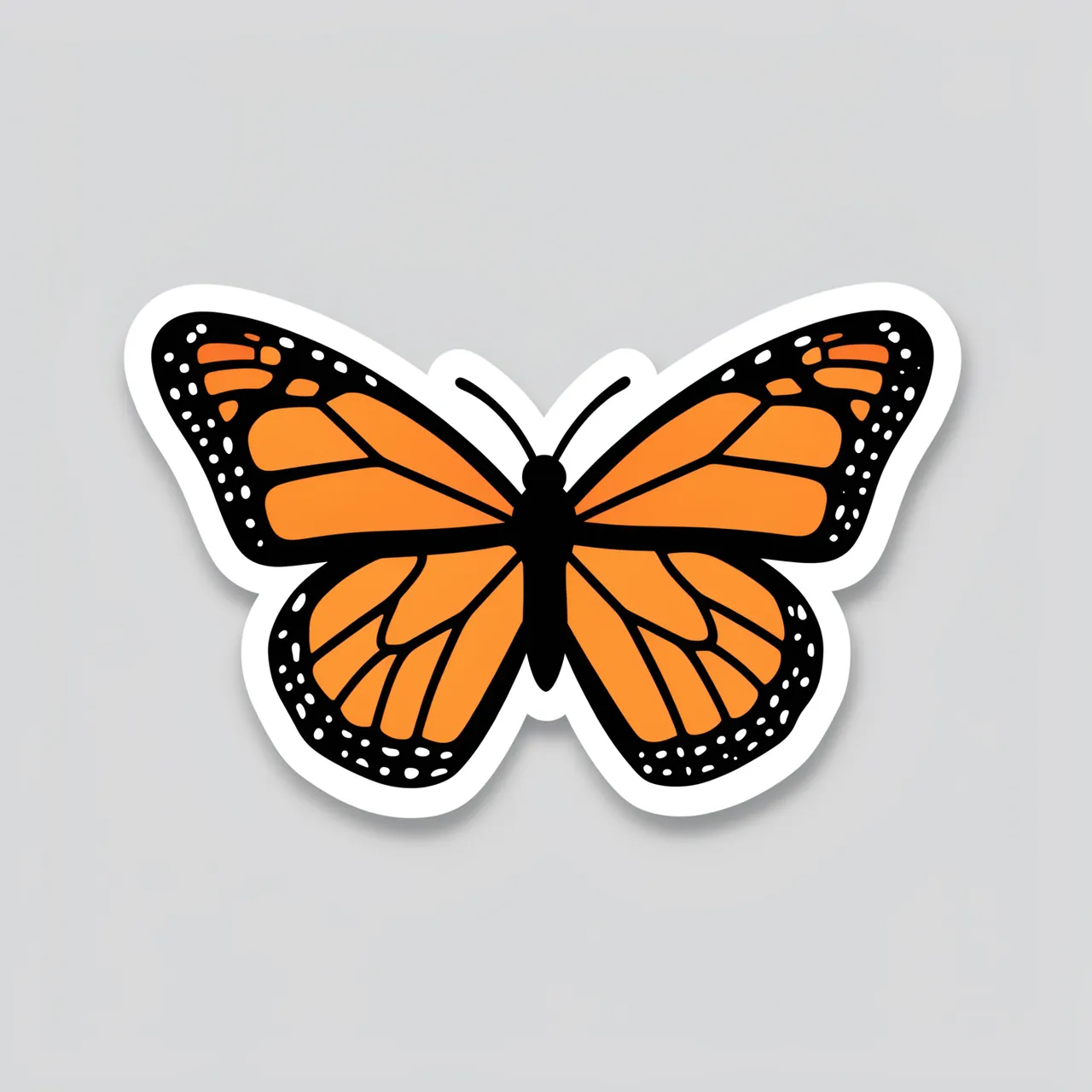 Die-cut monarch butterfly sticker with open wings rests on a plain light gray background