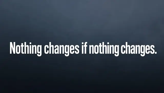 Bold white sans-serif text reading "Nothing changes if nothing changes." centered on a dark slate gradient desktop wallpaper.