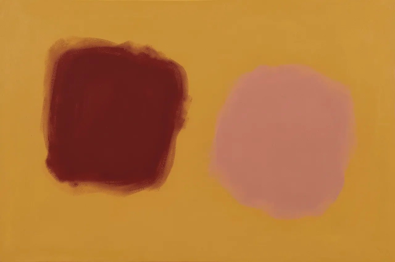 Soft-edged maroon and dusty rose shapes float across a warm ochre background