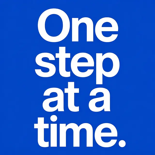 Bold white sans-serif text reading "One step at a time." centered on a solid cobalt blue background