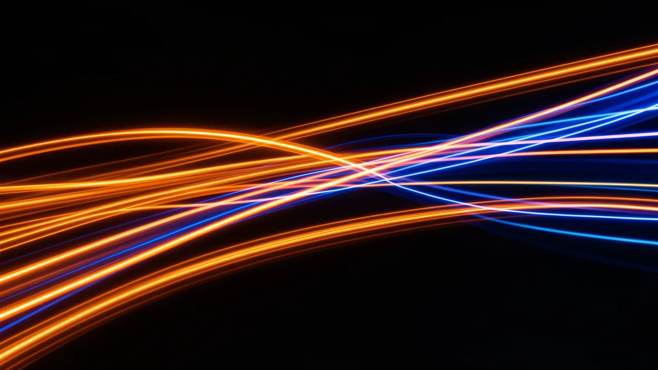 Glowing orange and blue light painting streaks cross against a solid black background