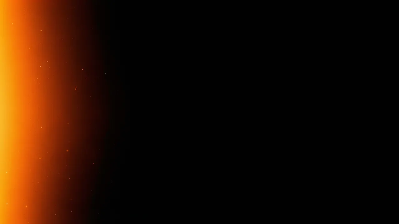 Warm orange glowing light leak bleeds in from the left edge of a solid black film background