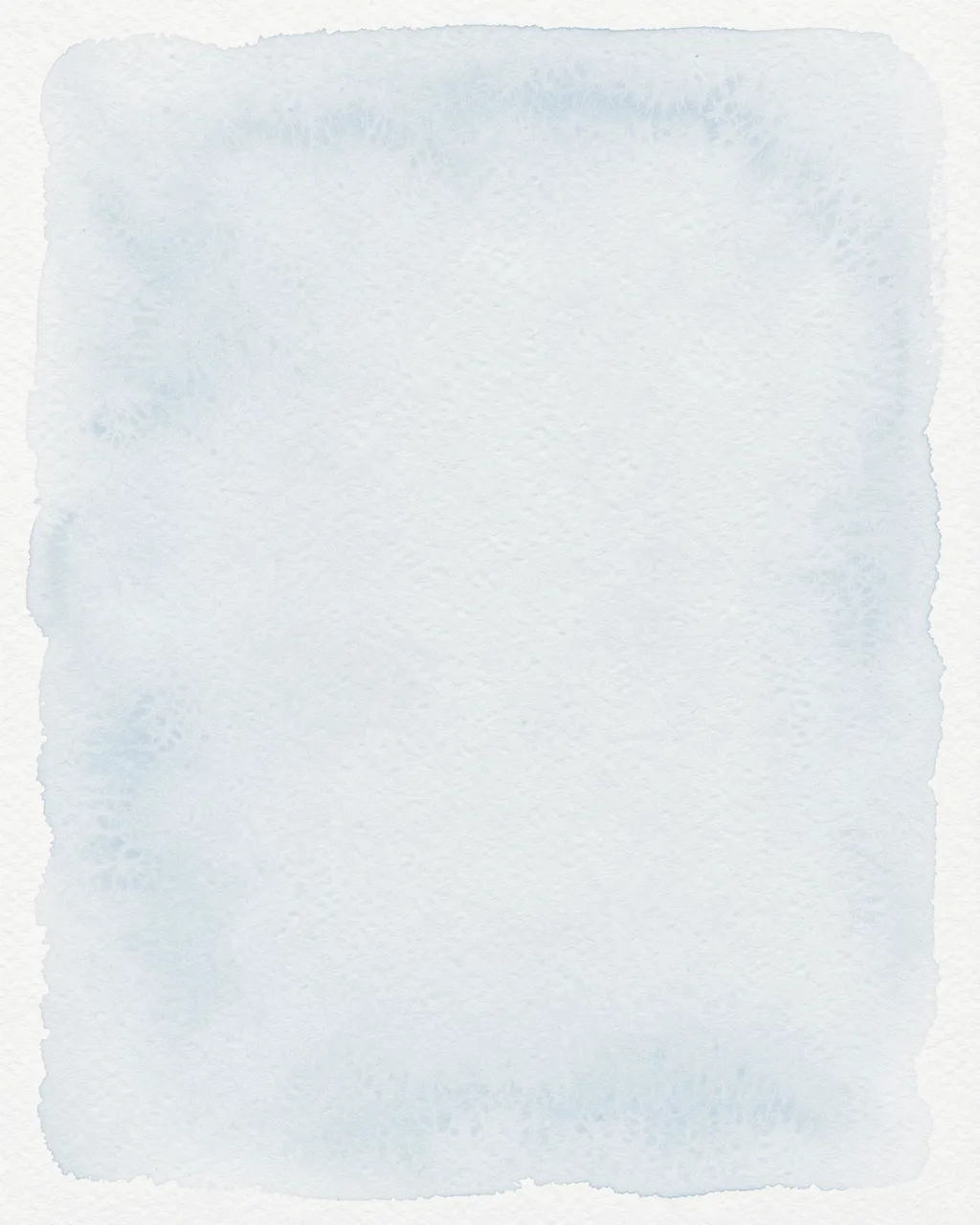 Cold press watercolor paper with a soft pale blue wash fading gently toward the edges