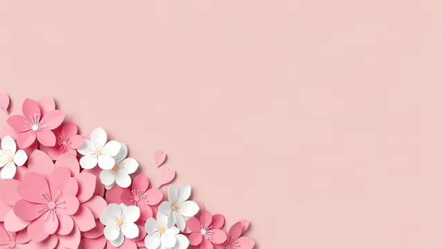 Layered paper cut pink and white blossoms cluster in the lower left of a soft blush empty background