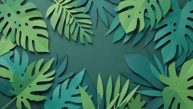 A symmetrical frame of layered paper cut tropical leaves in green and teal surrounds a solid dark teal empty center
