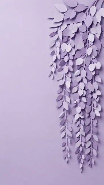 Layered purple paper-cut wisteria foliage cascades down the right side of a solid lavender background with empty left copy