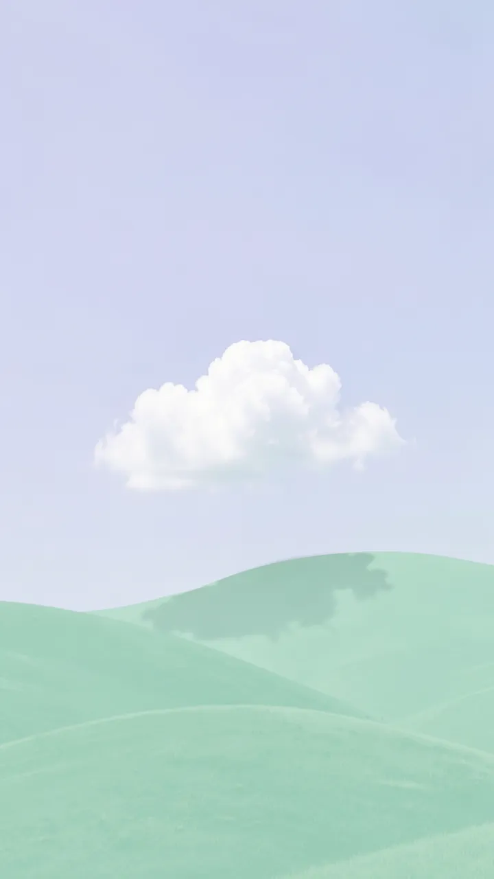 A lone fluffy white cloud casts a soft shadow on smooth rolling mint green hills beneath a pale lavender sky
