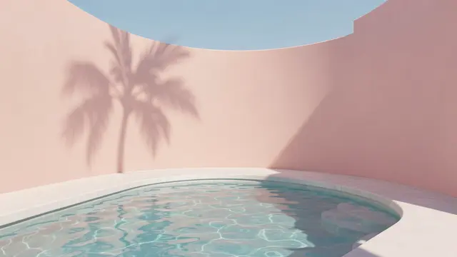 Curved pink wall frames a small pool with a palm tree shadow cast under pale blue sky
