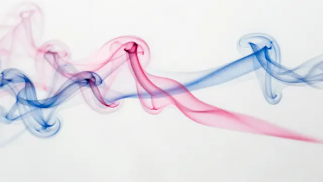 Wispy pastel pink and blue smoke swirls and drift across a plain white background.