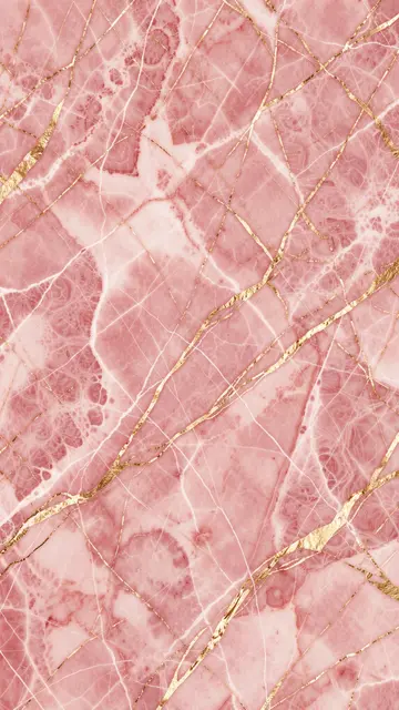 Vertical full frame of soft pink marble with thin shimmering gold and white veining