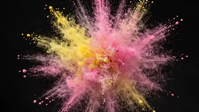 Dynamic burst of swirling pink and yellow powder against a solid black background