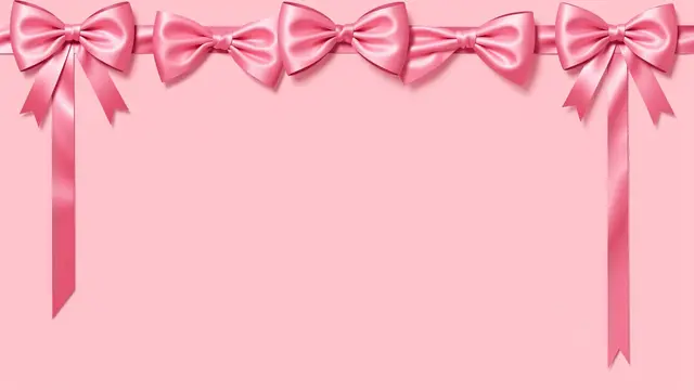 Glossy pink satin bows with trailing ribbons line the top edge of a solid blush pink empty background