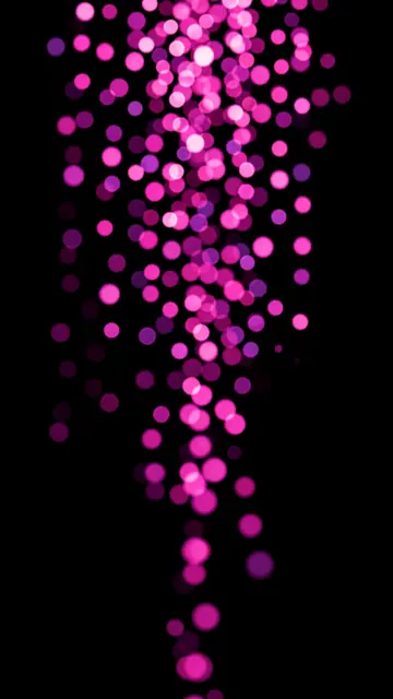 Soft pink and purple bokeh circles drift vertically down a solid pure black background