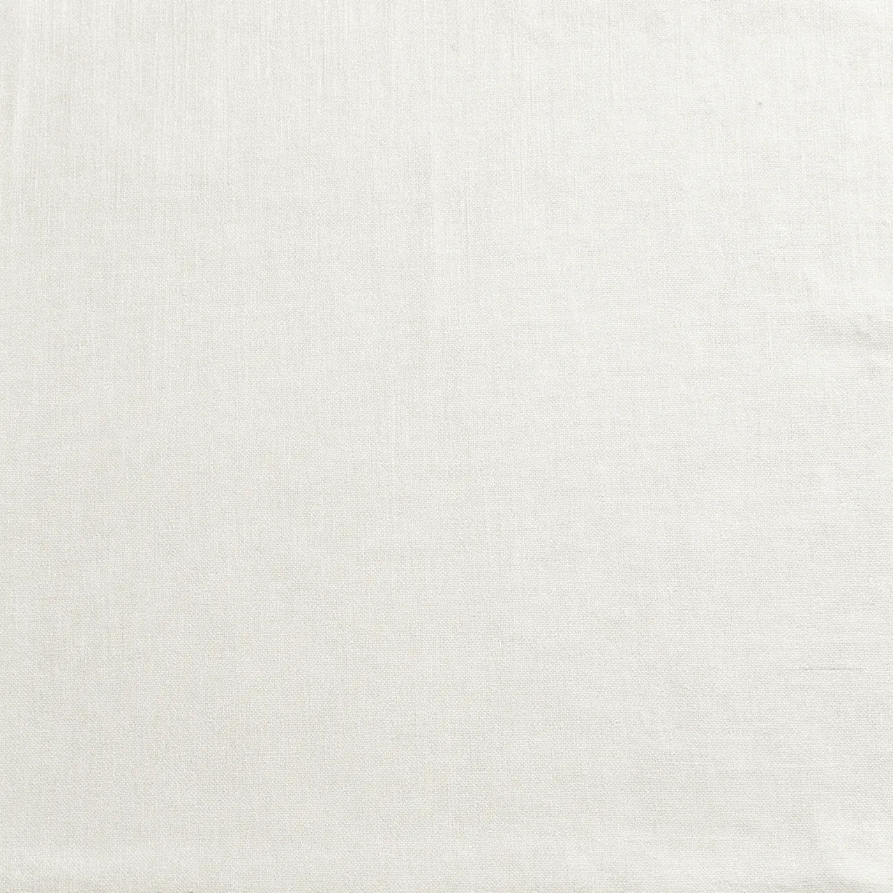 Full frame close-up of tight woven bleached white linen fabric with even soft lighting