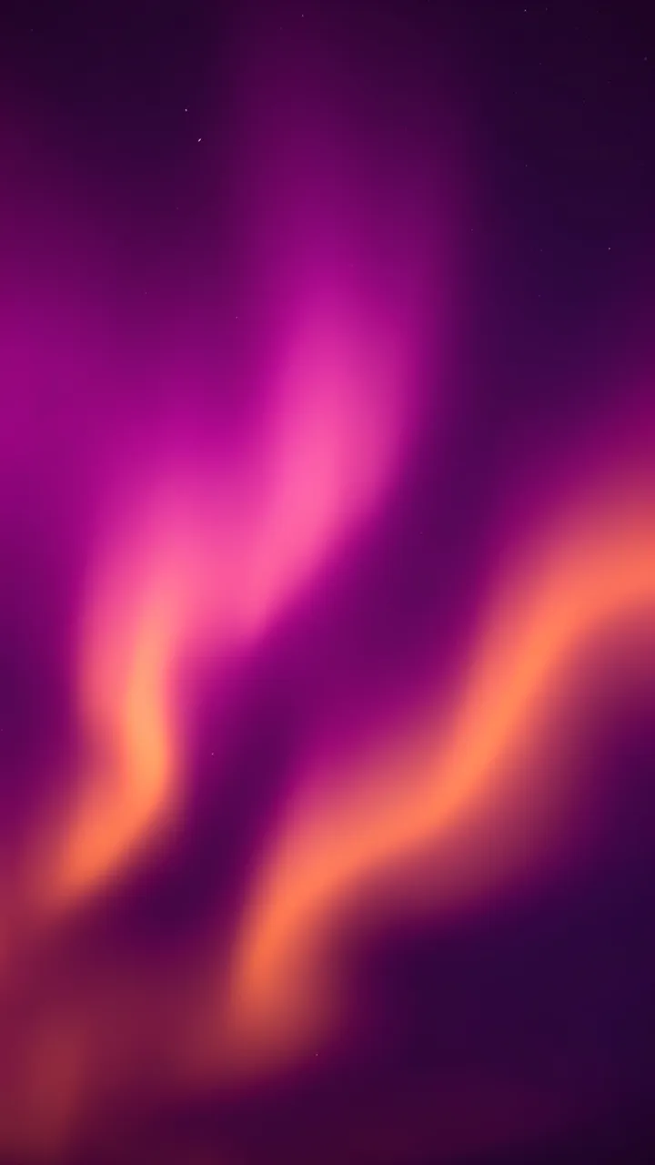 Smooth glowing wavy gradient of magenta and orange aurora light over a deep purple background