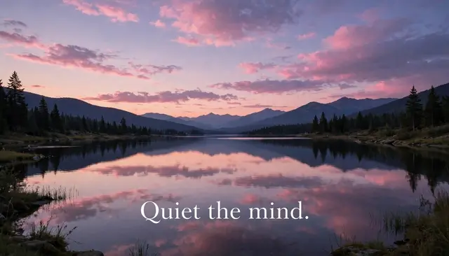 A calm mountain lake reflects a pink dusk sky, with serif text reading "Quiet the mind."