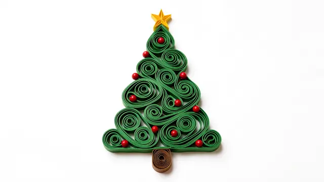 Quilled green paper Christmas tree with red bead ornaments and yellow star on a plain white background