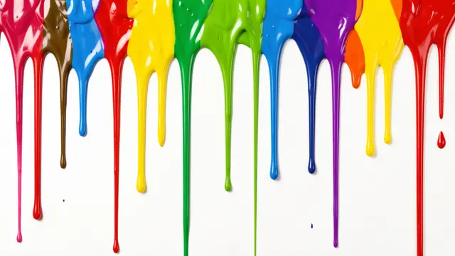 Glossy multicolored paint drips run vertically down a plain white background