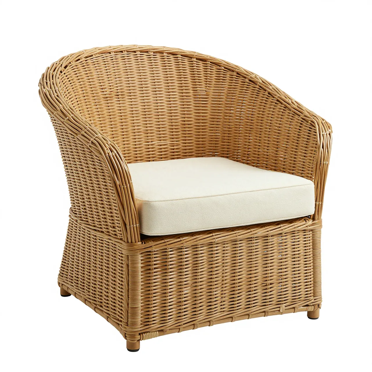 A round woven rattan accent chair with a cream cushion sits against a plain white studio background.