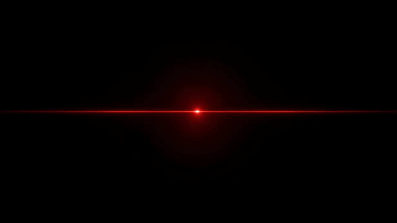 A thin horizontal red lens flare line with a bright glowing center sits on a solid pure black background