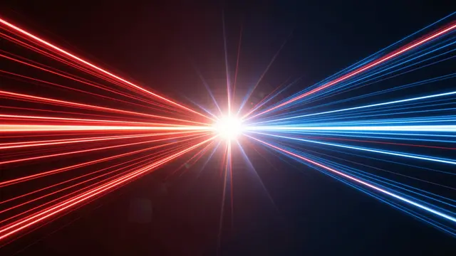 Bright red light trails from the left and blue light trails from the right meet in a glowing central flash against a dark