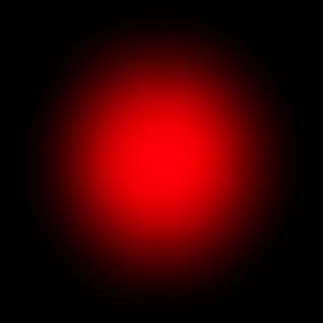 A soft blooming red light leak fades gently into a solid pure black background