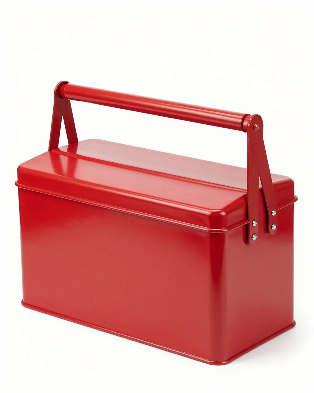 A closed glossy red metal toolbox with a folding handle sits on a plain white studio background