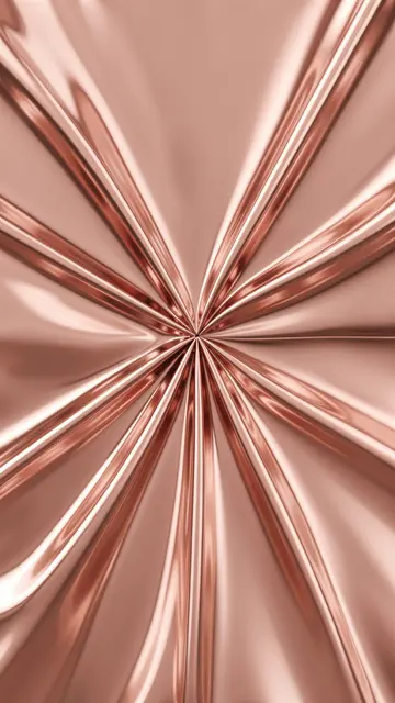 Glossy rose gold liquid metal forms radial folded creases on a soft blush background