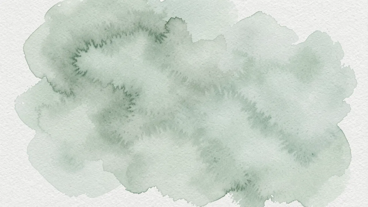 Soft blended sage and mint green watercolor wash on textured off-white watercolor paper