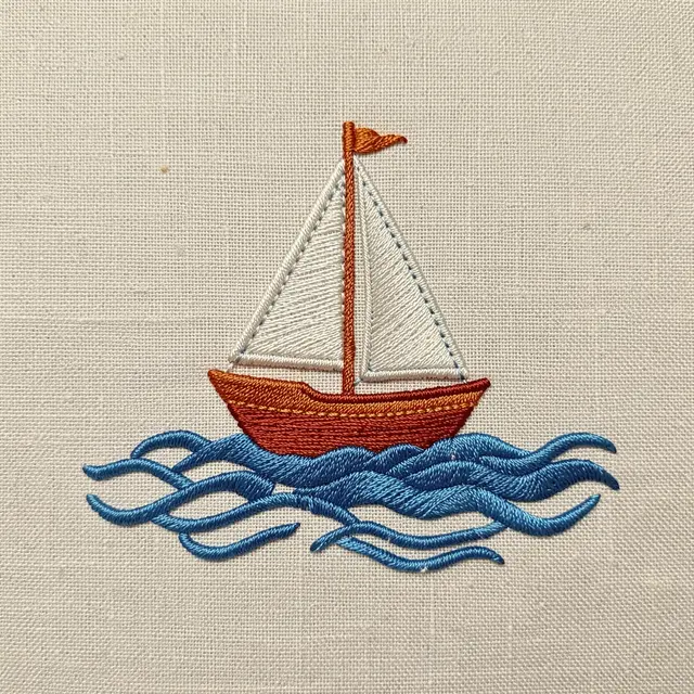 Stitched embroidery of a small sailboat on blue wave threads set on textured off-white linen fabric
