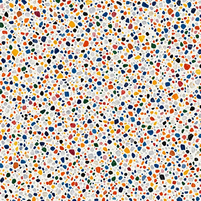 A seamless terrazzo texture with scattered multicolored aggregate chips set in a pale white base