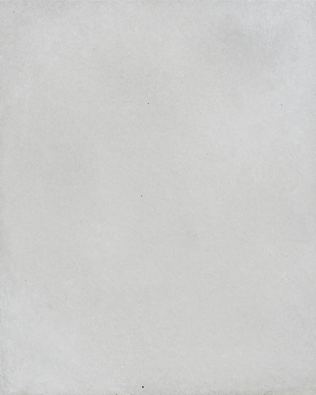 Full frame view of an evenly roughened pale gray shot-blasted concrete surface under flat light