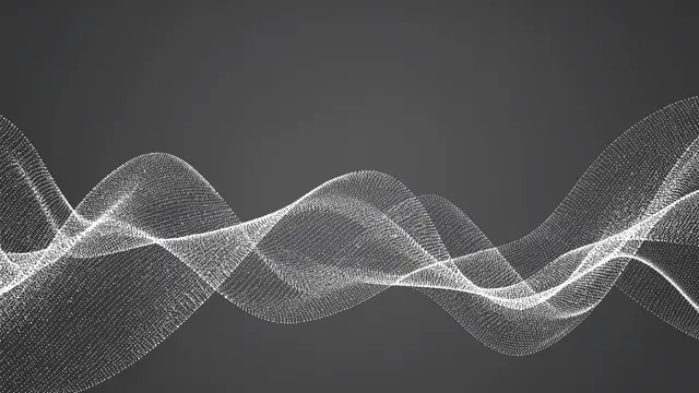 Flowing wavy silver particle lines curve across a smooth dark gray background with empty top copy space